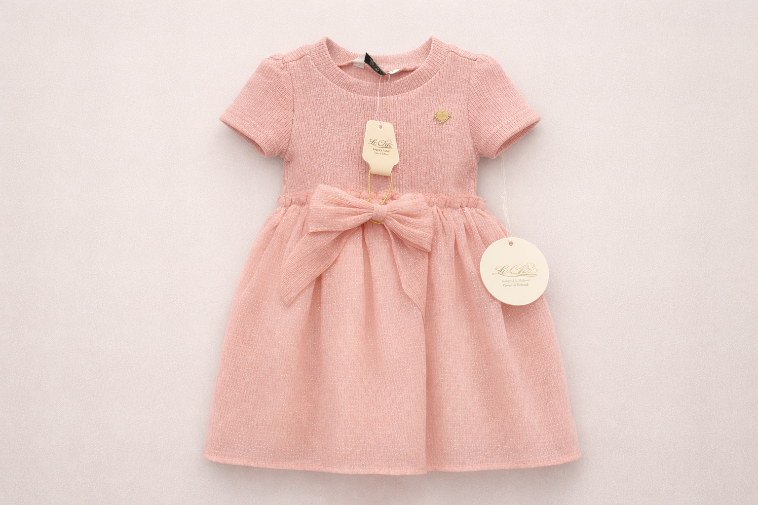 Le Chic pink ribbed bow dress for girls with tulle skirt on neutral background